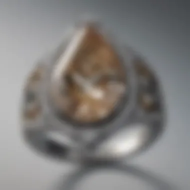 Pear-shaped diamond ring with intricate vintage design