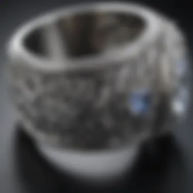 Detailing the Beauty of Intricate Silver Designs A close-up of a silver ring with intricate designs.