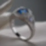 A pristine silver ring resting on a soft cloth, showcasing its shine.