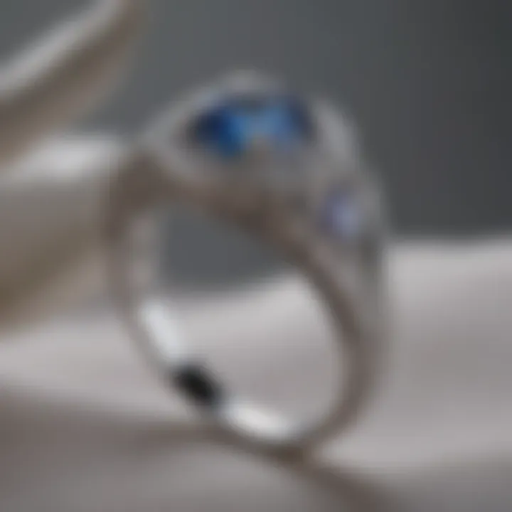 A pristine silver ring resting on a soft cloth, showcasing its shine.