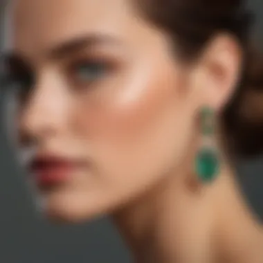 Sophisticated pair of earrings with emeralds, presenting a modern twist on classic designs.