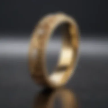 A gold wedding band showcased on a velvet surface