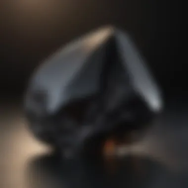 A beautifully polished obsidian piece, showcasing its sleek, glassy surface and deep black color.