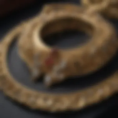 An ornate gold jewelry piece displayed on dark velvet, signifying luxury and craftsmanship.