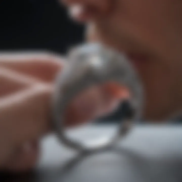 White gold diamond ring being appraised by a professional jeweler