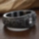 Elegant black titanium ring with intricate design