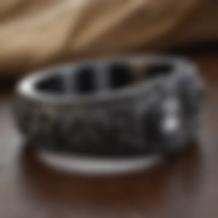 Elegant black titanium ring with intricate design