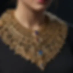 Intricate gold necklace featuring unique designs inspired by Philadelphia's architecture