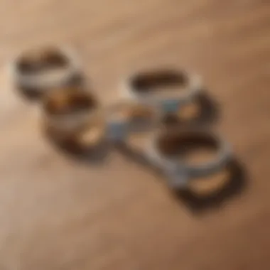 A variety of minimalist rings displayed on a wooden surface