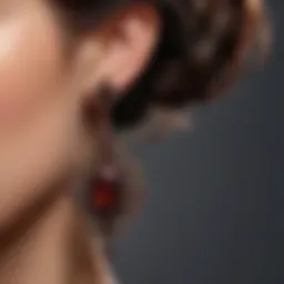 Close-up of a bohemian garnet earring showcasing its intricate design and deep red hues