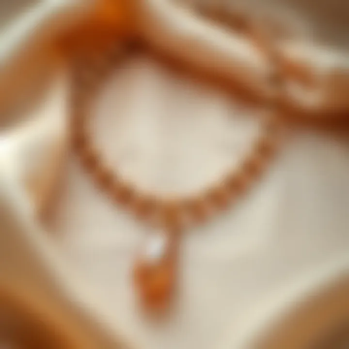 A beautiful brown pearl necklace displayed on a soft fabric background, showcasing its elegance.