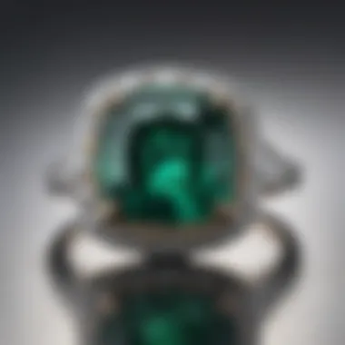 An elegant cushion cut emerald diamond ring set in a vintage-inspired design