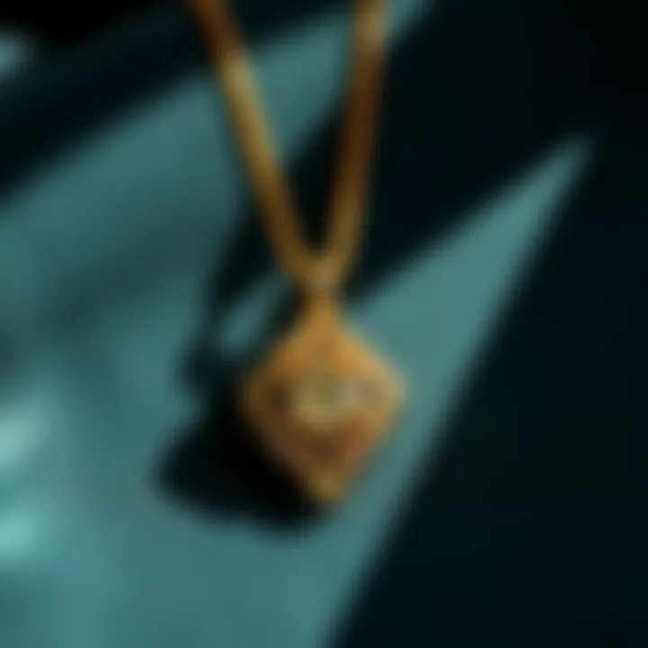 Jared gold pendant displayed on a velvet surface