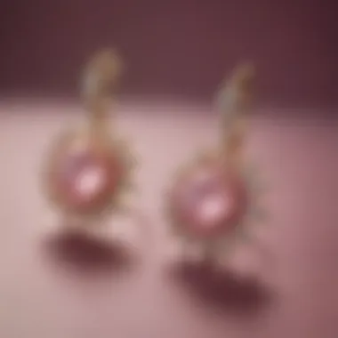 Elegant Display of Pink Star Sapphire Earrings Elegant pink star sapphire earrings displayed on a velvet background