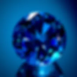 A close-up of a sparkling sapphire gemstone, highlighting its deep blue hue and clarity.