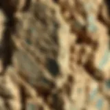 Close-up of a rough stone rock showcasing its unique texture and color patterns