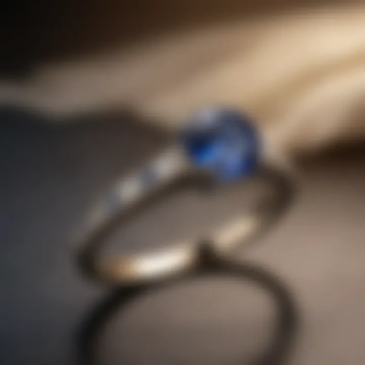 Modern sapphire engagement ring with a minimalist band