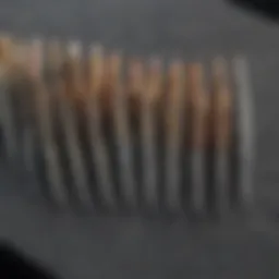 Close-up of various small needle files arranged neatly on a workbench, showcasing their unique shapes and sizes.
