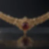 Close-up of a gold necklace being cleaned with a soft cloth