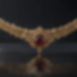 Close-up of a gold necklace being cleaned with a soft cloth