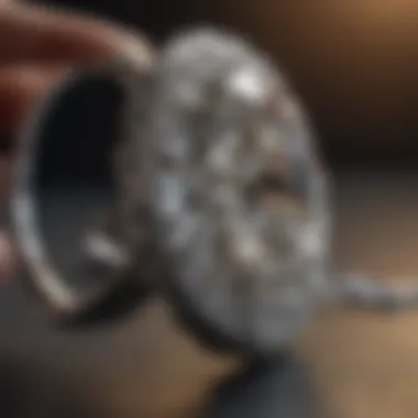 Diamond ring being evaluated under magnifying glass