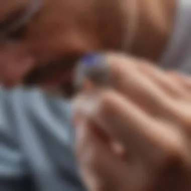 A jeweler carefully adjusting a ring's size with expertise