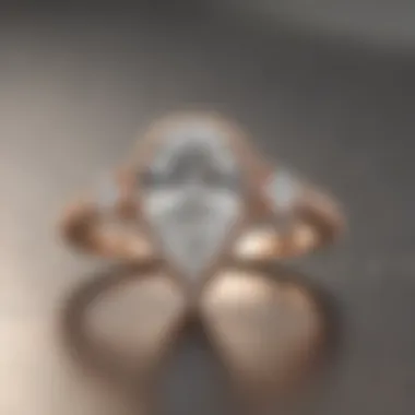 Pear-Shaped Diamond Solitaire Ring with Rose Gold Band