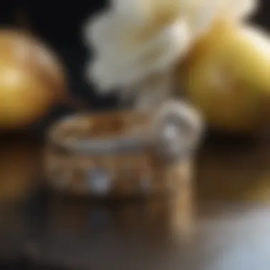 Personalized wedding bands displayed beside a pear engagement ring