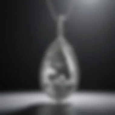 Graceful Glamour: Tear Drop Shaped Diamond Pendant Tear Drop Shaped Diamond Pendant with Delicate Chain