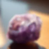 Close-up view of a raw amethyst crystal showcasing its unique formations