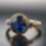 A close-up view of a stunning blue sapphire ring set in a delicate gold band.