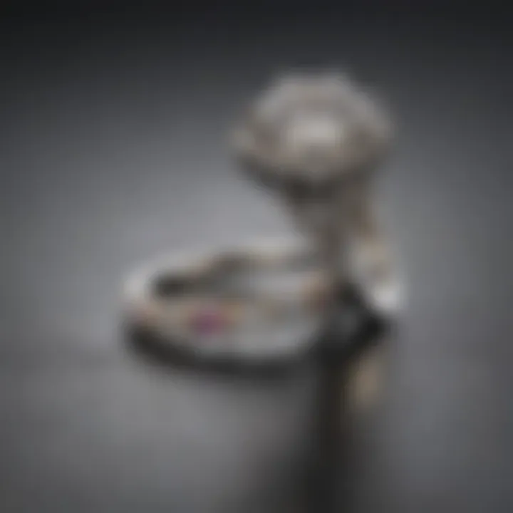 Close-up view of a two-carat ring on a delicate finger showcasing its brilliance.