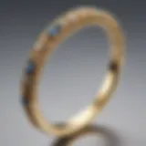 Elegant thin gold engagement band with intricate details