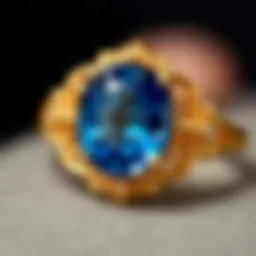 A close-up of a radiant blue sapphire ring set in elegant gold