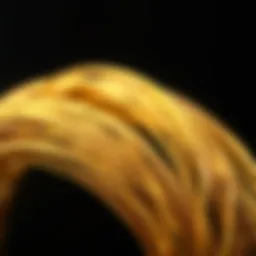 Close-up view of gold colored solder wire showcasing its texture and sheen