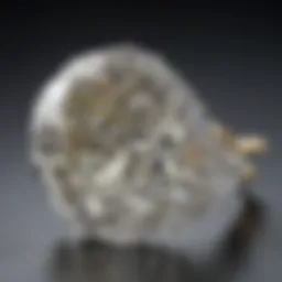 Close-up view of a pear-shaped diamond in a prong setting, showcasing its brilliance