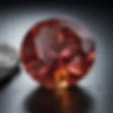 A close-up view of a gemstone being subjected to a scratch test, showcasing the technique used for hardness evaluation.