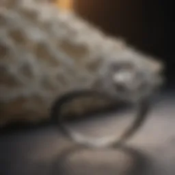 An elegant diamond ring displayed on a velvet surface