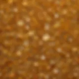 A close-up view of a yellow crystal showcasing its unique patterns and shine