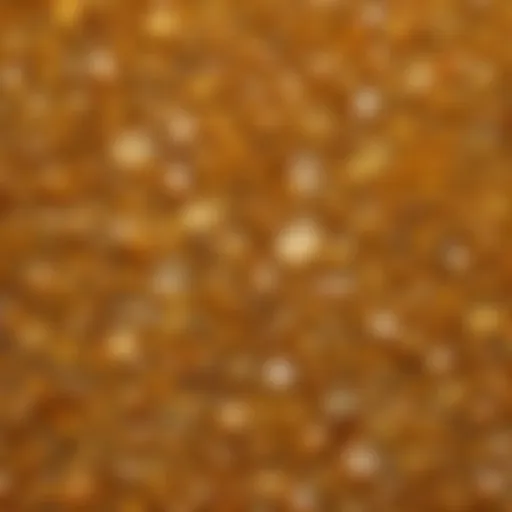 A close-up view of a yellow crystal showcasing its unique patterns and shine